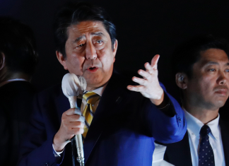 Exit polls show win for Japanese PM Abe's ruling coalition (Report)