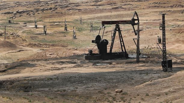 This July 30, 2017 photo, shows an oil field controlled by the Kurdish-led Syrian Democratic Forces (SDF), in Rmeilan, Hassakeh province, northeast Syria. The SDF, with air support from the U.S.-led coalition, said Sunday, Oct. 22, 2017 that they had captured the Al-Omar field, SyriaÃ¢â¬â¢s largest oil field, from the Islamic State group, marking a major advance against the extremists and for now keeping the area out of the hands of pro-government forces. (AP Photo/Hussein Malla)