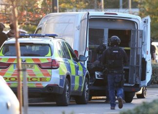 Man with shotgun arrested after allegedly holding 2 people hostage at UK bowling alley (Report)