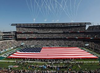 The story behind the massive American flags at sporting events (Report)