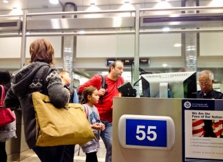 Passengers 'held against their will' at airport because officers were late (Report)