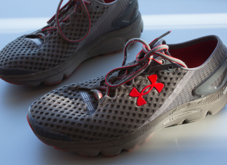 Under Armour, faltering, cuts its outlook and shares plunge (Report)