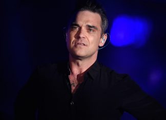 Robbie Williams reveals he cancelled tour after “very worrying” test results (Report)