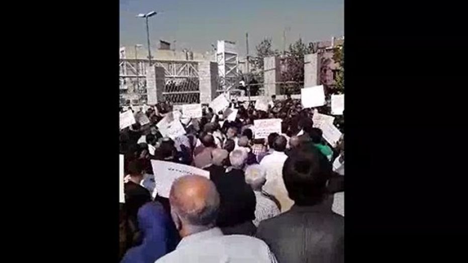 More than 2,000 Iranians protested the country’s parliament because of plundered savings and corrupt policies.