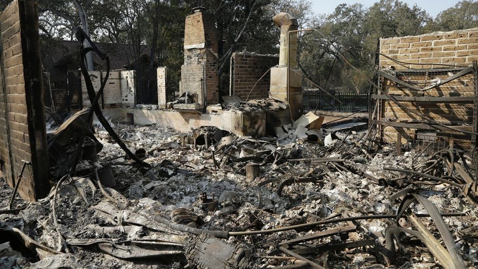 Remains of a home destroyed by wildfires seen Wednesday, Oct. 18, 2017, in Glen Ellen, Calif.
