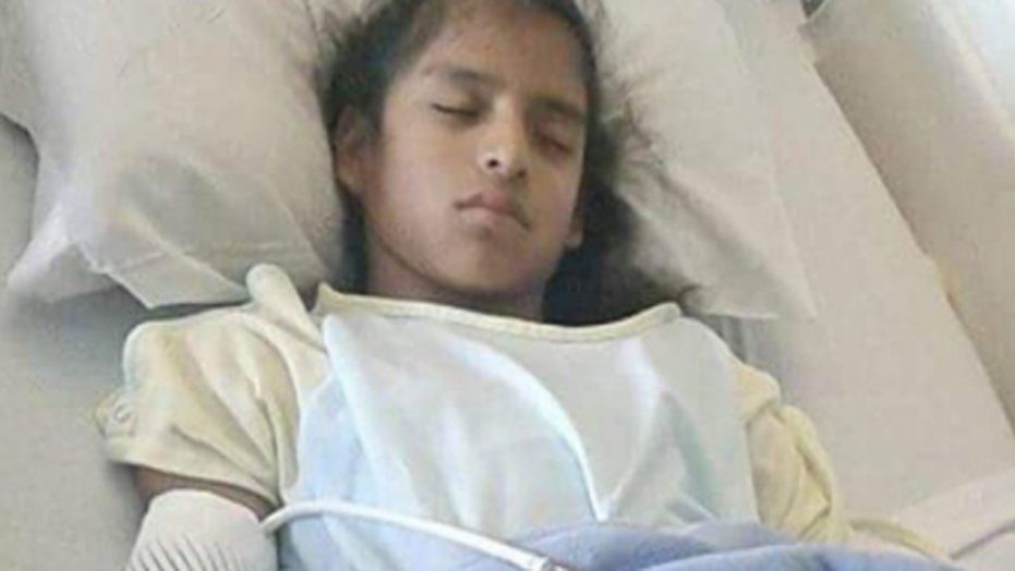 Rosamaria Hernandez, 10, recovers from emergency surgery to treat her cerebral palsy at Driscoll Children's Specialty Center in Laredo, Texas.