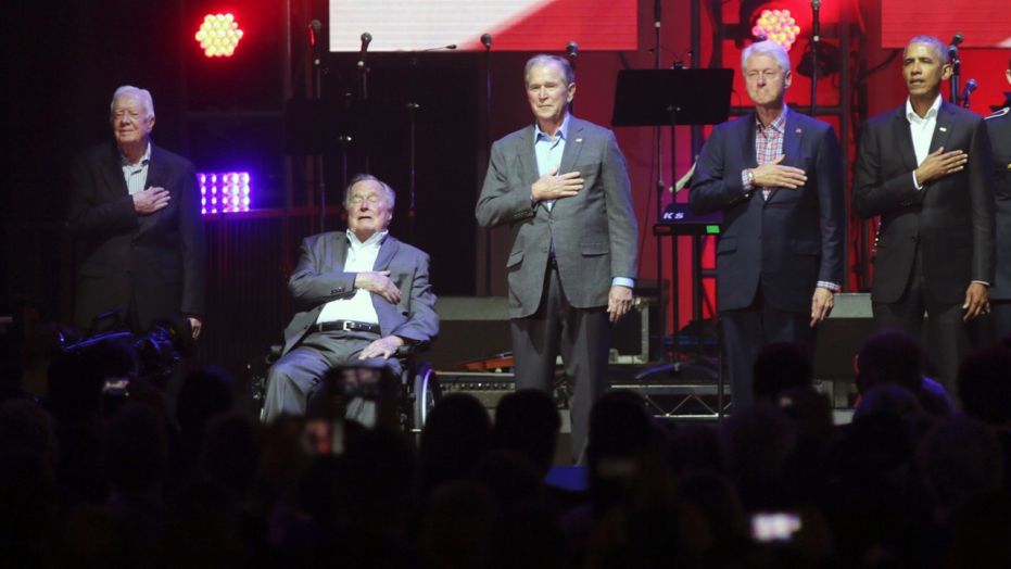 Former Presidents, left to right, Jimmy Carter, George H.W. Bush, George W. Bush and Barack Obama appeared together Saturday for the first time since 2013.