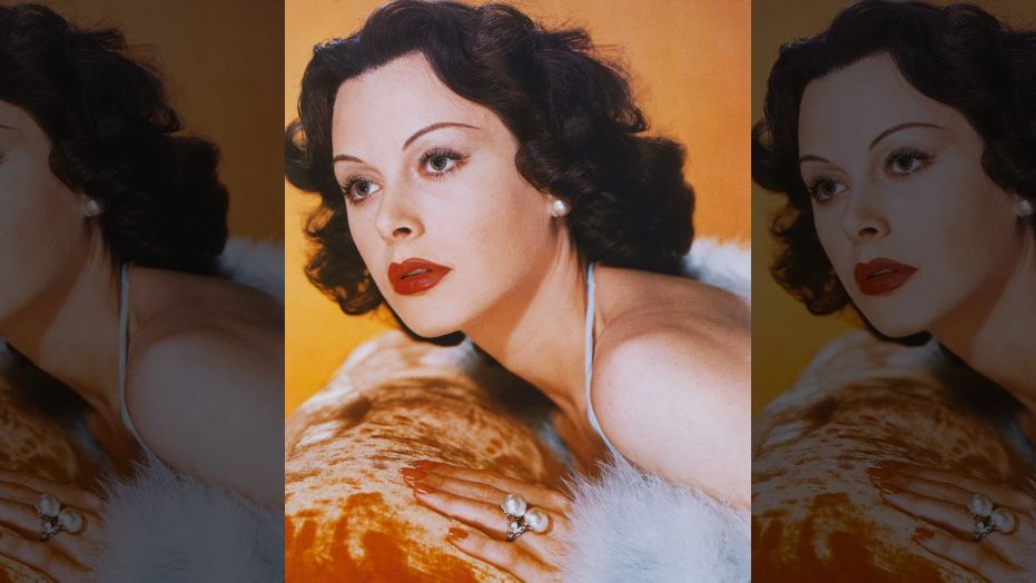 Headshot of Hedy Lamarr (1913-2000), Austrian actress, leaning against velour-covered surface, in a studio portrait, 1940. (Photo by Silver Screen Collection/Getty Images)