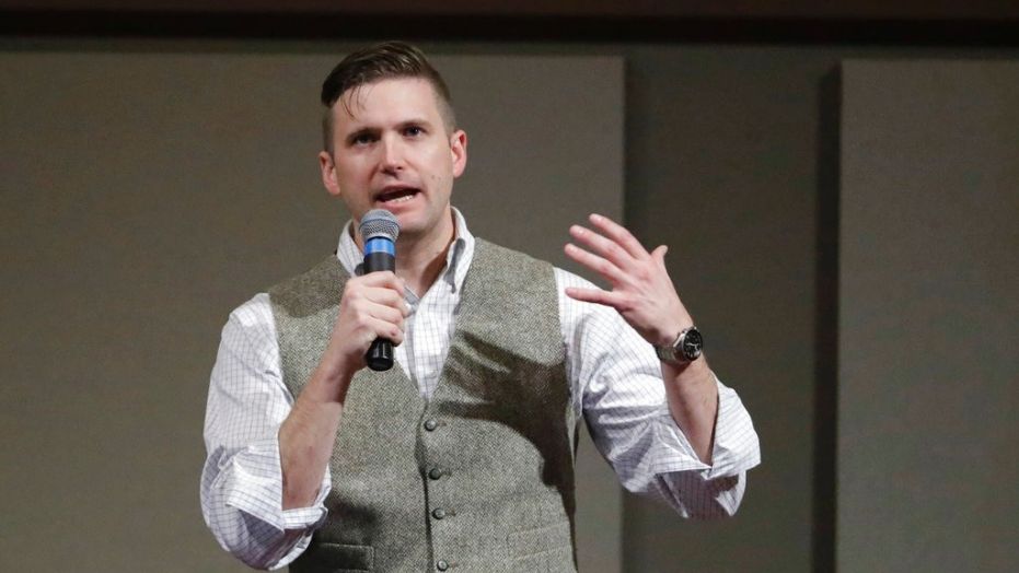 White supremacist Richard Spencer cut his planned two-hour speech early as he was continuously booed and protested.