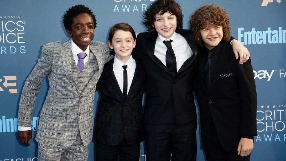 "Stranger Things" star Finn Wolfhard (pictured second from right) fired his agent who was accused of sexual assault.