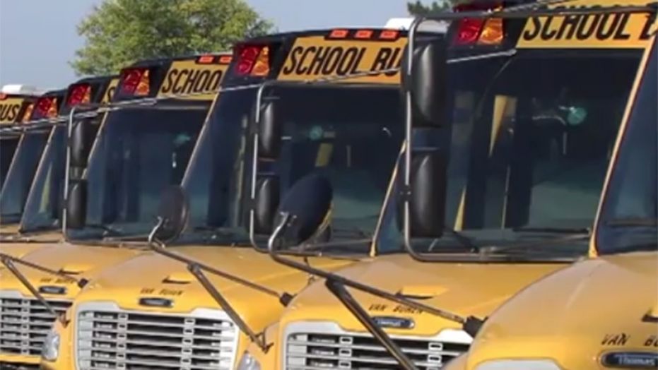 Police and a school district in Michigan say an unmarked school bus has been trying to pick up students.