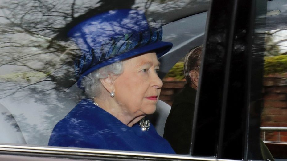 Britain's Queen Elizabeth II in a car with Prince Philip in January.