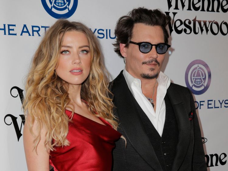 Amber Heard and Johnny Depp in January this year