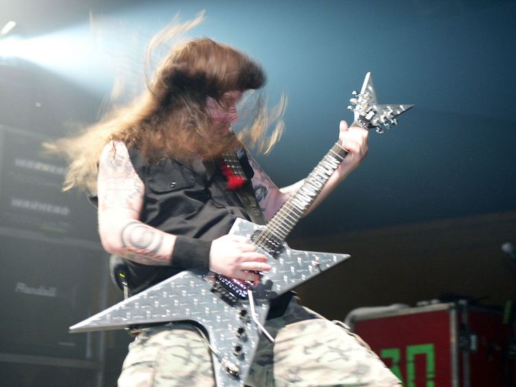 NEW YORK - APRIL 1: Heavy metal band guitarist &#39;Dimebag&#39; Darrell Abbott of Damage Plan performs on stage during MTV2 Headbangers Ball Tour on April 1, 2004 at the Roseland Ballroom, in New York City. (Photo by Scott Gries/Getty Images)