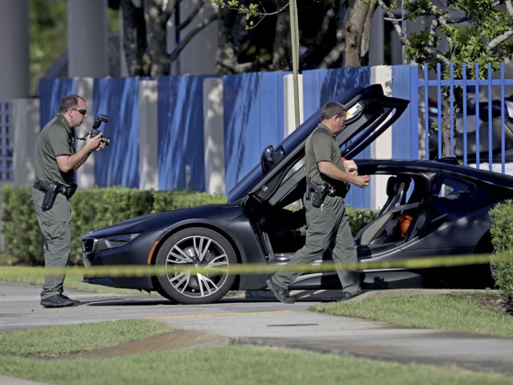 Investigators surround the car in which XXXTentacion was shot                                                                                                                                      