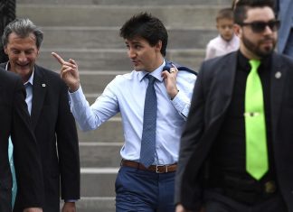 Trudeau urges Canadians to travel and buy Canadian in the face of U.S. trade dispute (Details)