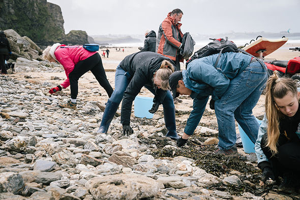 Volunteers cleaning up a Cornwall beach