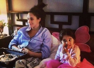 Meghan Markle pictures: Duchess puts her feet up with goddaughter in throwback snap | Royal | News (Details)