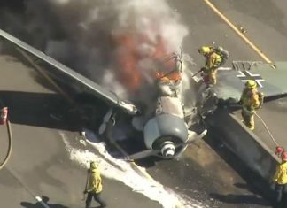 California plane crash: WWII era plane crashes into busy highway in US California plane crash: WWII era plane crashes into busy highway in US