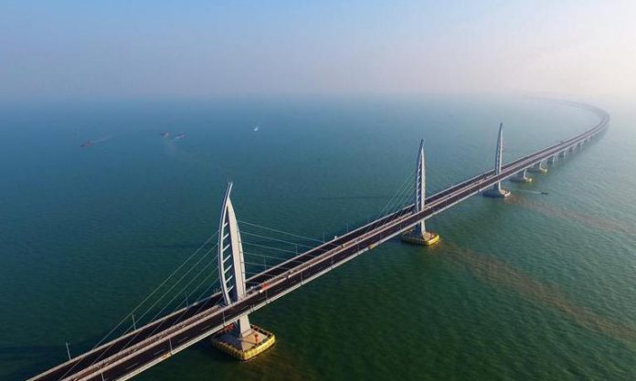 World's longest sea-crossing bridge open nine years of construction