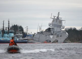 Norway’s warship collides with oil tanker in fjord Norway's warship collides with oil tanker in fjord