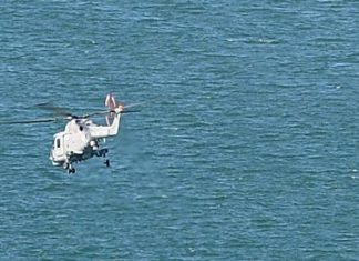 Royal Navy rescues brit and three children, Report Royal Navy rescues brit and three children, Report