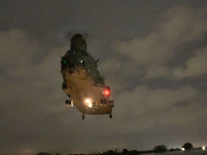 UK flood warnings: helicopter sent to help severely flooded regions
