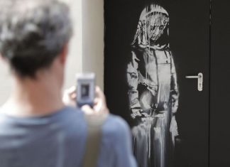 Stolen Banksy work found in Italy (police) Stolen Banksy work found in Italy (police)