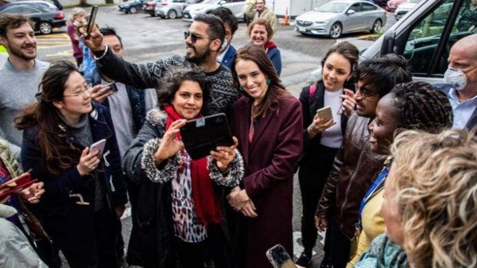 Jacinda Ardern apologises after taking selfies close up with supporters, Report