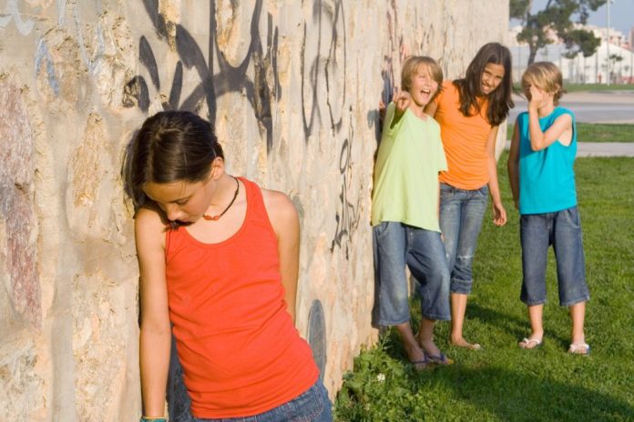 Teen bullying doubles adult depression reports new study