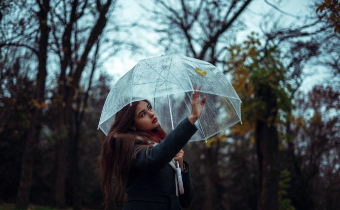 Compose a pop song about adventures in the summer rain